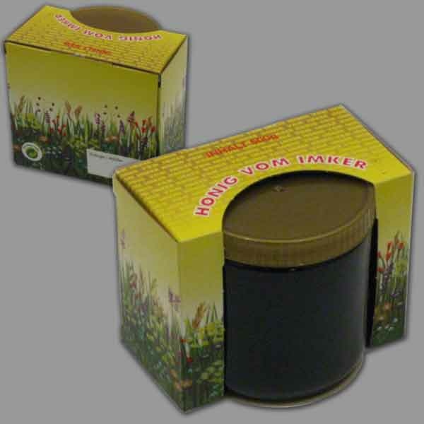 Diese Wickelpackung Blumenwiese für 500 g-Glas besticht durch ihren liebevollen Aufdruck Honig vom Imker und ein praktisches Stempelfeld auf der Rückseite. Ideal für Imker, die ihren Honig in stilvollen Verpackungen anbieten möchten.