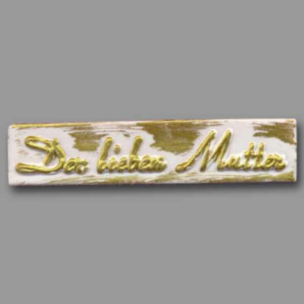 Der Schriftzug „Der lieben Mutter“ in Weiß-Gold ist eine zarte und stilvolle Verzierung für Muttertagskerzen. Mit 8,8 cm Länge einfach anzubringen und besonders dekorativ.
