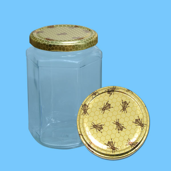 Neutrales 1000 g - Honigglas, sechseckig, mit TO-Deckel -gold mit Wabenmuster + Bienchen-, 82 mm Ø