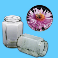 Dieses neutrale 1000 g Honigglas in sechseckiger Form ist...