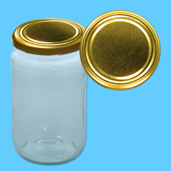 Das runde Honigglas mit 1000 g Fassungsvermögen und einem TO-Deckel in schlichter Gold-Optik passt perfekt in jedes Imker-Set. Das neutrale Design lässt den Honig selbst in den Mittelpunkt rücken.