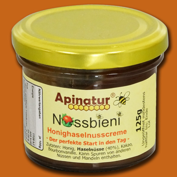 Diese cremige Nussbieni - Honighaselnusscreme vereint die Aromen von fein gerösteten Haselnüssen, hochwertigem Bienenhonig und zartem Kakao. Ein echtes Meisterwerk für den perfekten Start in den Tag. Ideal als Brotaufstrich oder zum Verfeinern von Desserts. Ein Genuss für alle, die die süße Kombination von Nüssen und Honig lieben.