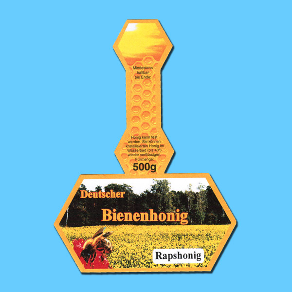 Diese Steg-Etiketten für Honiggläser, speziell für 500 g Glasbehälter, zeigen die Bezeichnung „Rapshonig“. Selbstklebend mit Deckellasche und einem klaren Aufdruck. Diese Etiketten sind ideal für die Honigabfüllung und -präsentation.