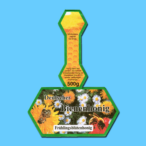 Die Steg-Etiketten für Honiggläser, 500 g, mit der Bezeichnung „Frühlingsblütenhonig“. Selbstklebend mit Deckellasche und einem gut sichtbaren Aufdruck, eignen sich diese Etiketten hervorragend für die Präsentation des Honigs.