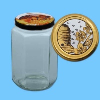 Das neutrale 1000 g Honigglas, sechseckig, mit TO-Deckel...